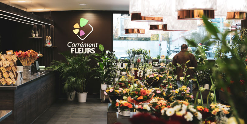 Design de franchise : concept de magasins Carrément Fleurs